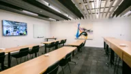 Large Ideation Studio with a built in A/V system and long table seating options, LoDo Denver Private Office & Coworking Space
