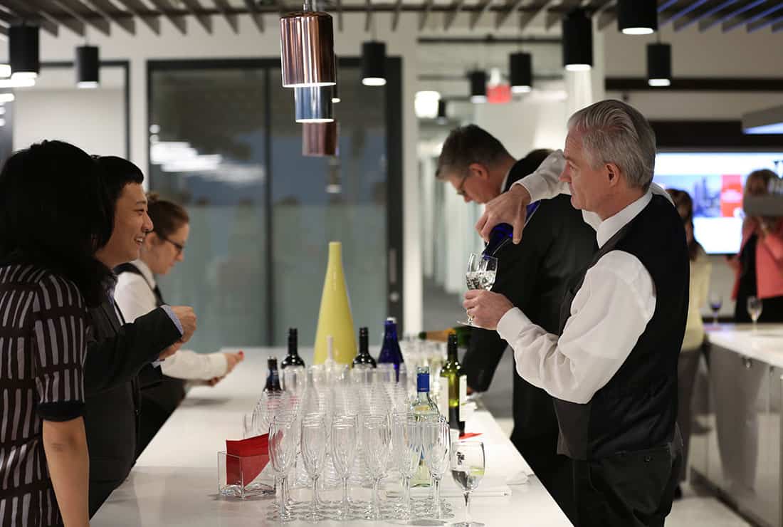 After-hours event hosted in coworking area with catered drinks