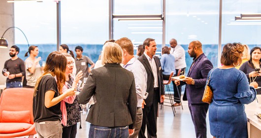 After hours social gathering in Coworking space with catered food in the cafe.
