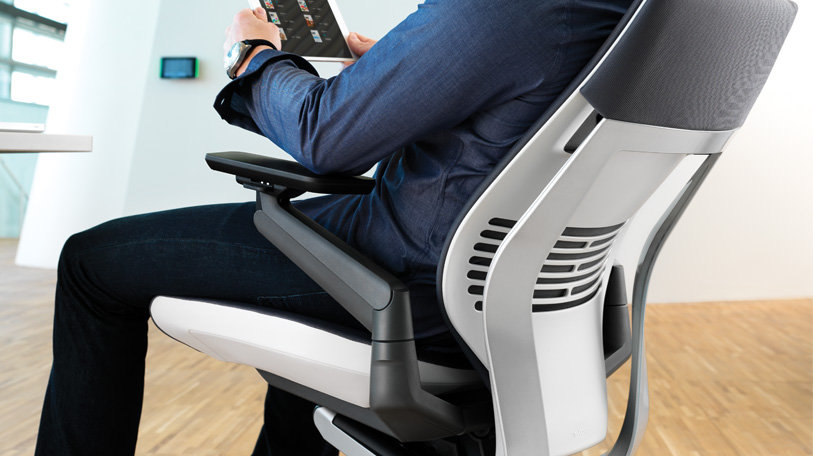 With workers spending a greater number of hours in their chairs, companies are envisioning new workstations to instill healthier habits in the workplace.