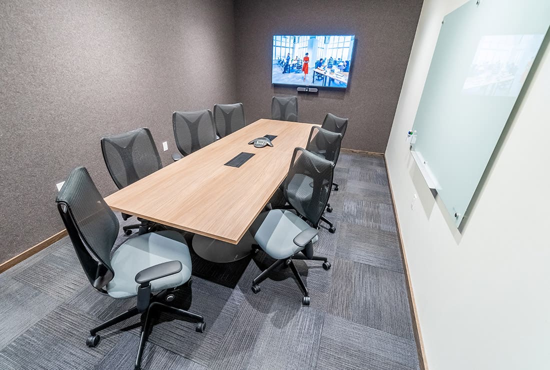 Boardroom with built in A/V and whiteboard. Can seat up to 10 people.
