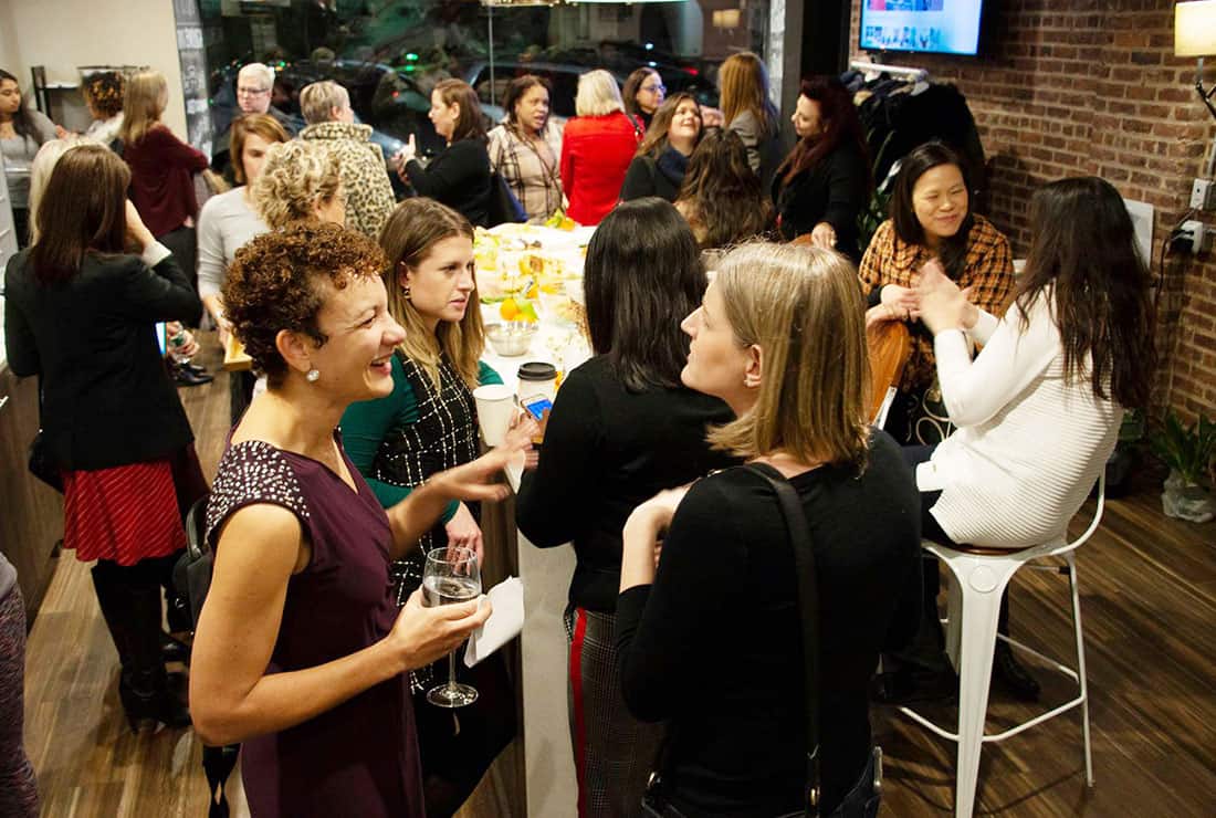 After-hours event hosted in coworking area with catered food and drinks