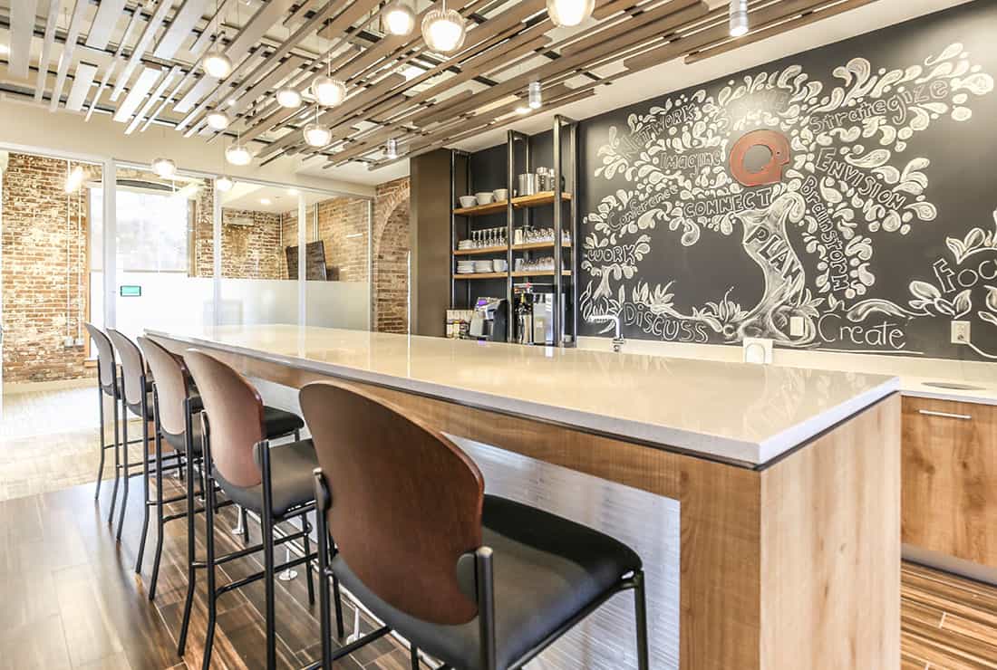 Open kitchen area with high-top table seating