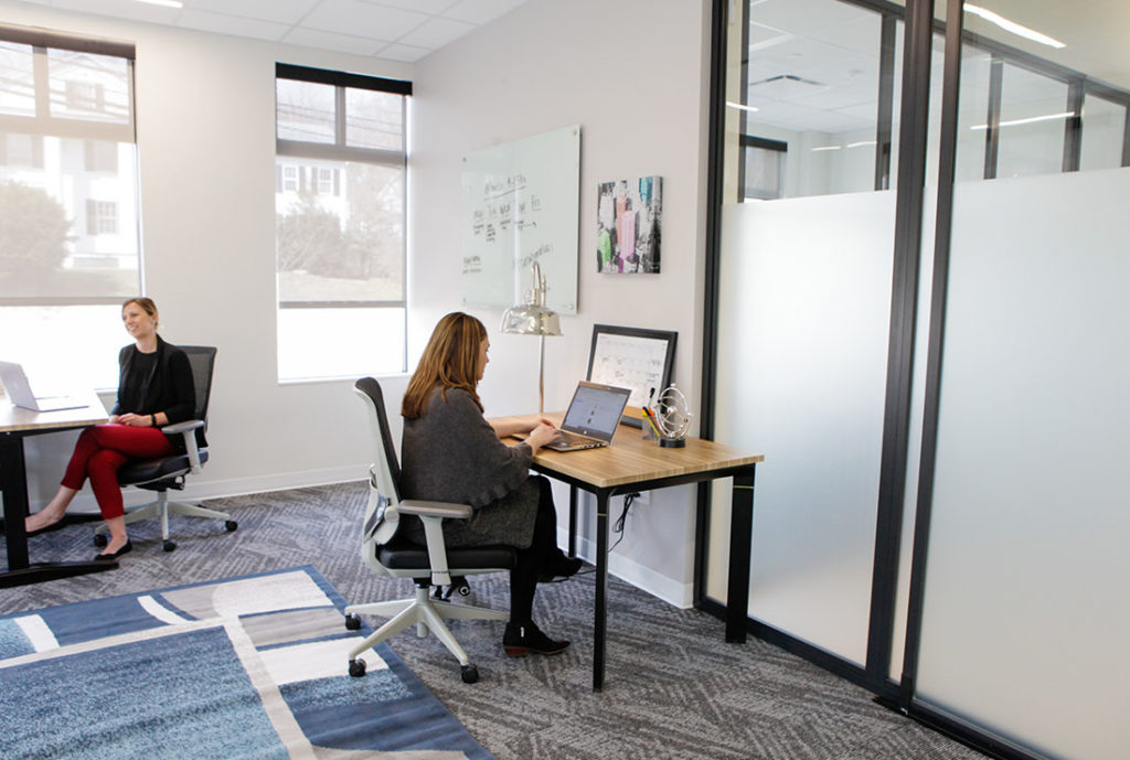 Two person private office with outdoor views.